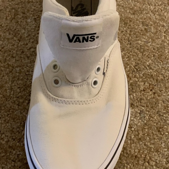 All white Vans with navy blue trim. - Picture 2 of 7